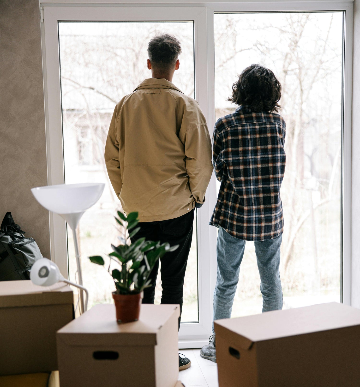 Mover repositioning furniture inside a Cincinnati home during an internal move